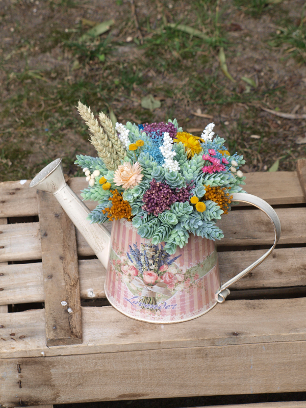 Regadera con flores - Flores en el Columpio