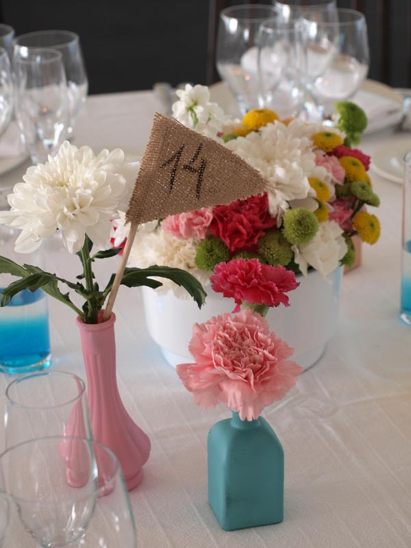 centros de mesa para una boda - Flores en el Columpio
