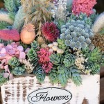 Centro de flores en caja de madera