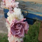 Corona de flores con gardenia preservada